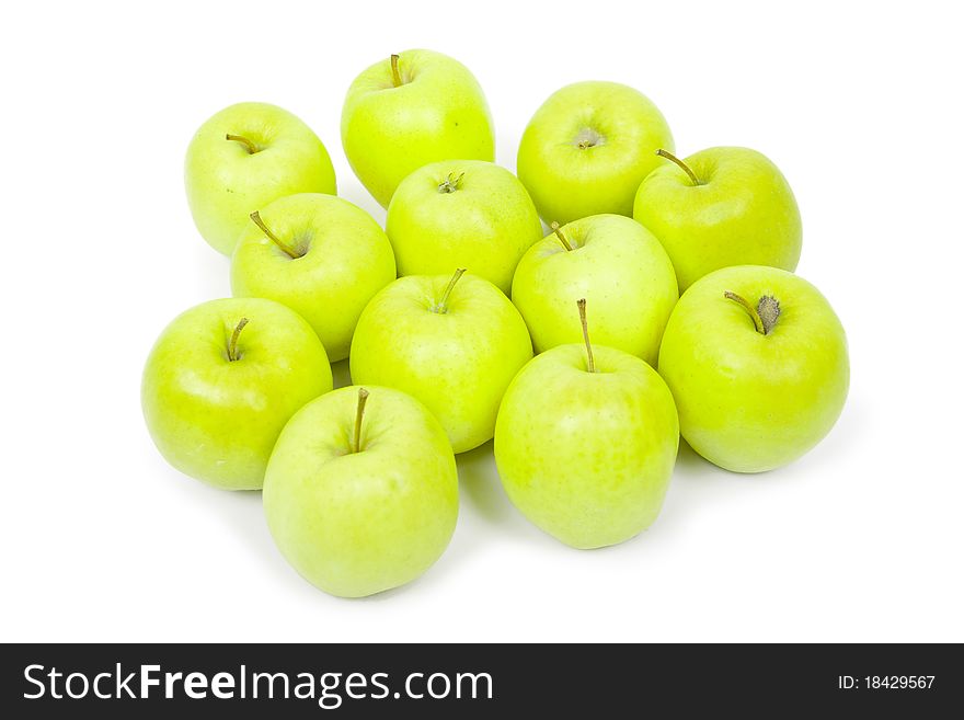 Green and yellow apples on a white background isolated