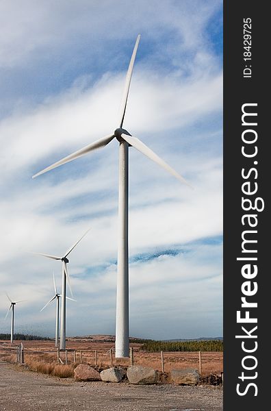 Windmills Against Blue Sky