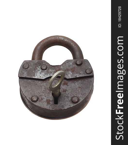 Old vintage lock and key on a white background (isolated).