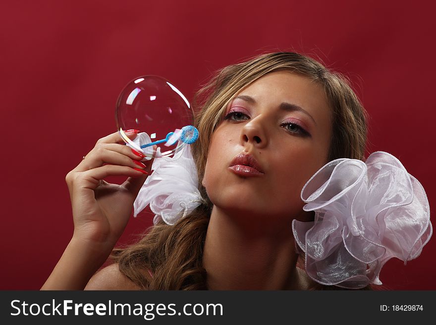 Girl with a soap bubbles