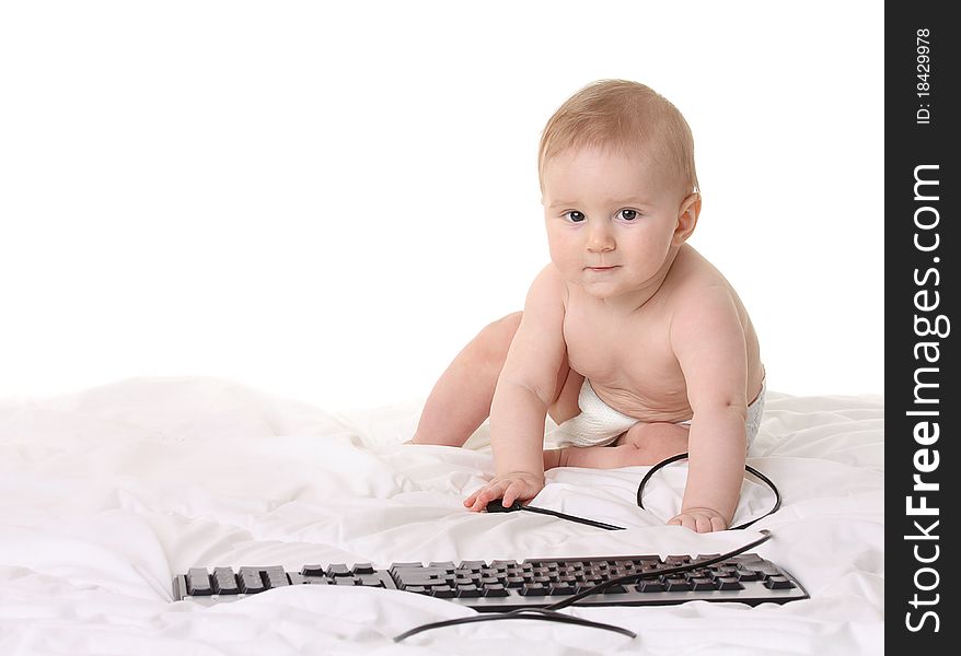 Cute baby with pc keyboard