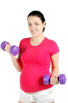 Young Pregnant Woman Making Exercise Royalty Free Stock Photography Young Pregnant Woman Making Exercise Royalty Free Stock Photography