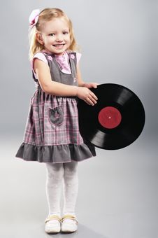 The Little Girl Holds Vinyl Record Stock Image The Little Girl Holds Vinyl Record Stock Image