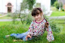 Little Girl Sits On Grass Royalty Free Stock Photos Little Girl Sits On Grass Royalty Free Stock Photos