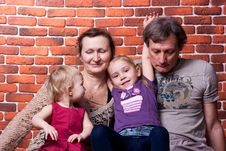 Happy Seniors Couple With Grandchildren Stock Photography