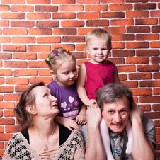 Happy Seniors Couple With Grandchildren Stock Images