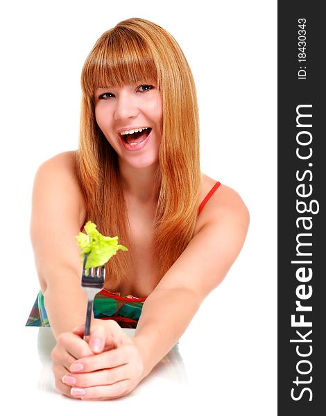 Healthy lifestyle concept. Girl with fork and salad isolated over white.