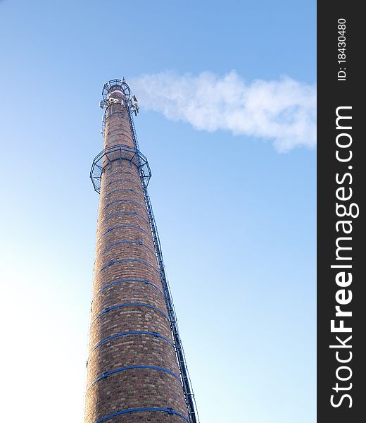 Brick chimney with suspended its antennas and platforms