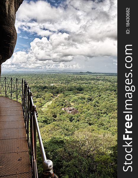 Walkway and view at the rock fortress of Sigiriya in Sri Lanka. Walkway and view at the rock fortress of Sigiriya in Sri Lanka