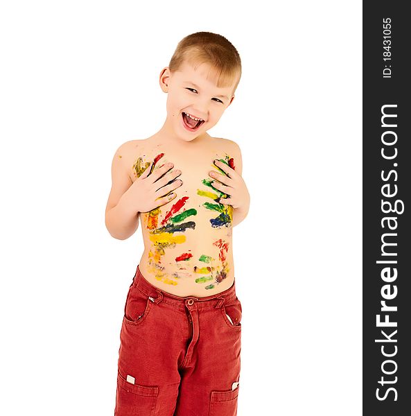 Adorable 5 year old boy covered in bright paint