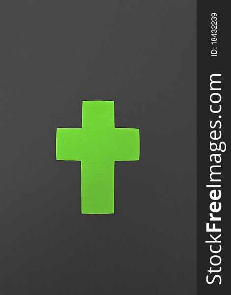 Green Cross isolated on grey