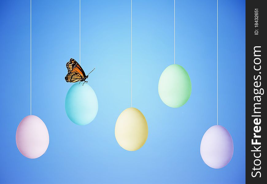 Colorful Easter Eggs hanging from strings