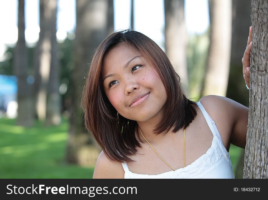 Portrait of pretty young asian woman with a lovely smile looking at the camera