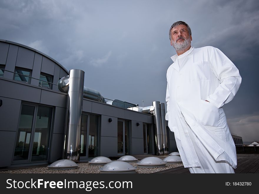 Doctor standing on the roof of the research center