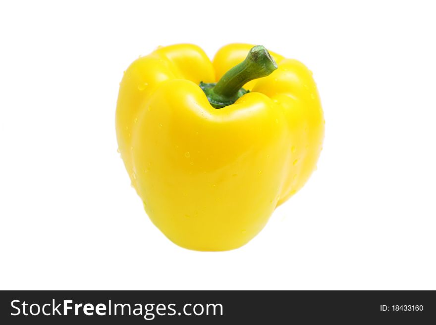 Close up of a yellow pepper isolated on white background.