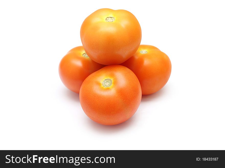 Close up of tomatoes isolated on white background.