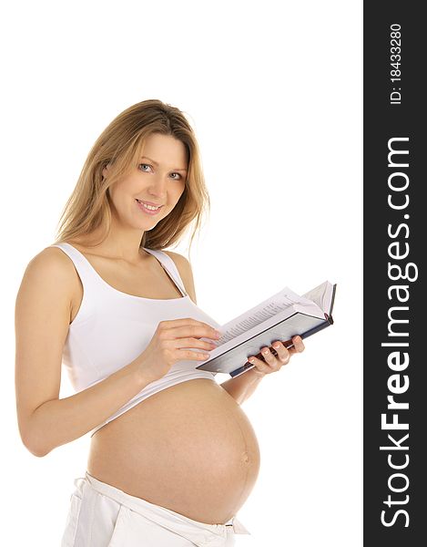 Pregnant woman reading a book isolated on white