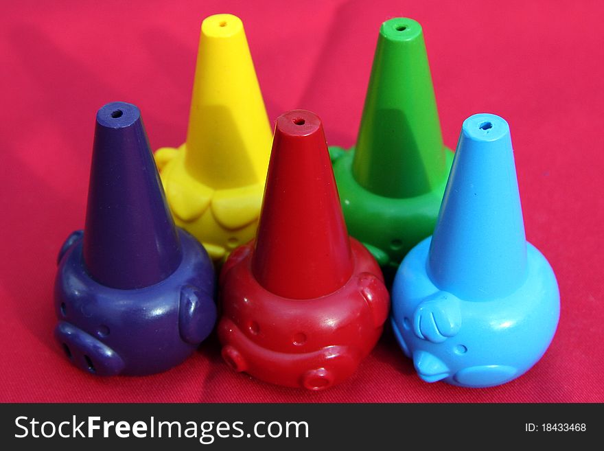 Five Colored Wax Crayons