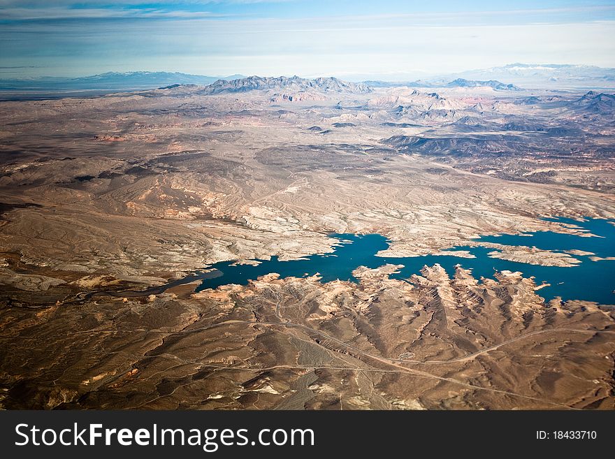 Aerial photograph of lake and rocky desert in western USA. Aerial photograph of lake and rocky desert in western USA