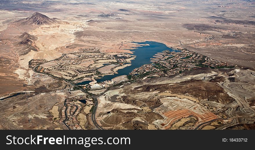 Aerial photograph of lake and rocky desert in western USA. Aerial photograph of lake and rocky desert in western USA