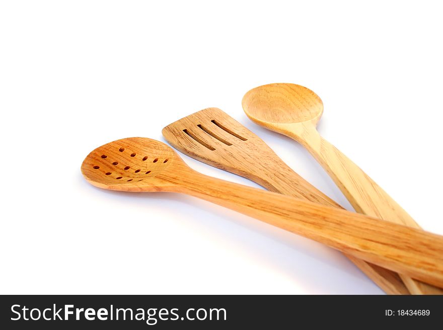 Wooden kitchen devices isolated on white background. Wooden kitchen devices isolated on white background.