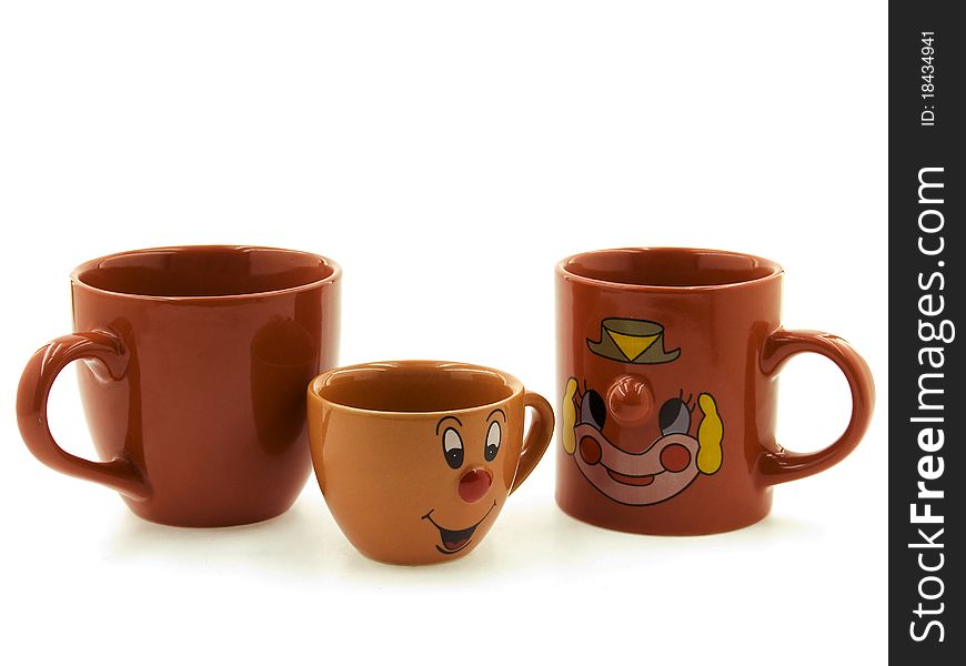 Three different cups are standing beside each other