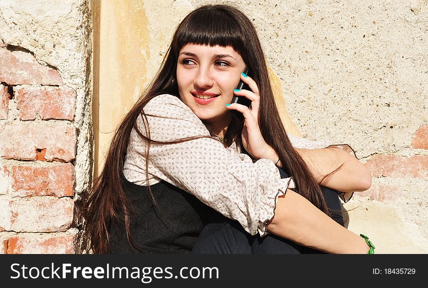 Teenager girl outside on the phone