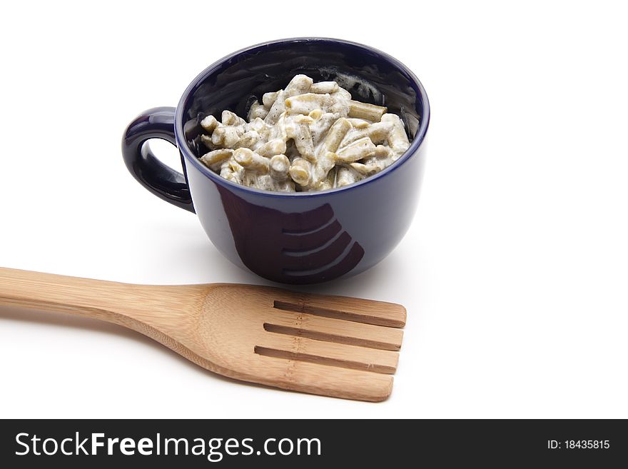 French bean salad in blue ceramic cup. French bean salad in blue ceramic cup