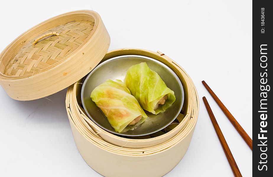 Chinese steamed dim sum cabbage in bamboo containers traditional cuisine