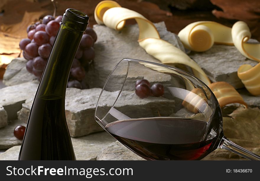 Wine grape and cheese on rock. Wine grape and cheese on rock