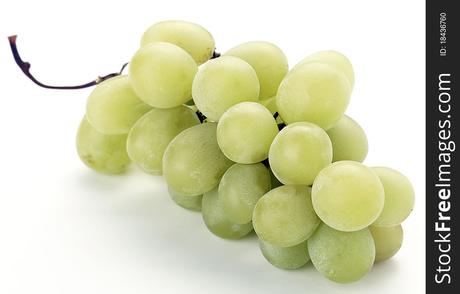 A shot of a bunch of green grapes isolated