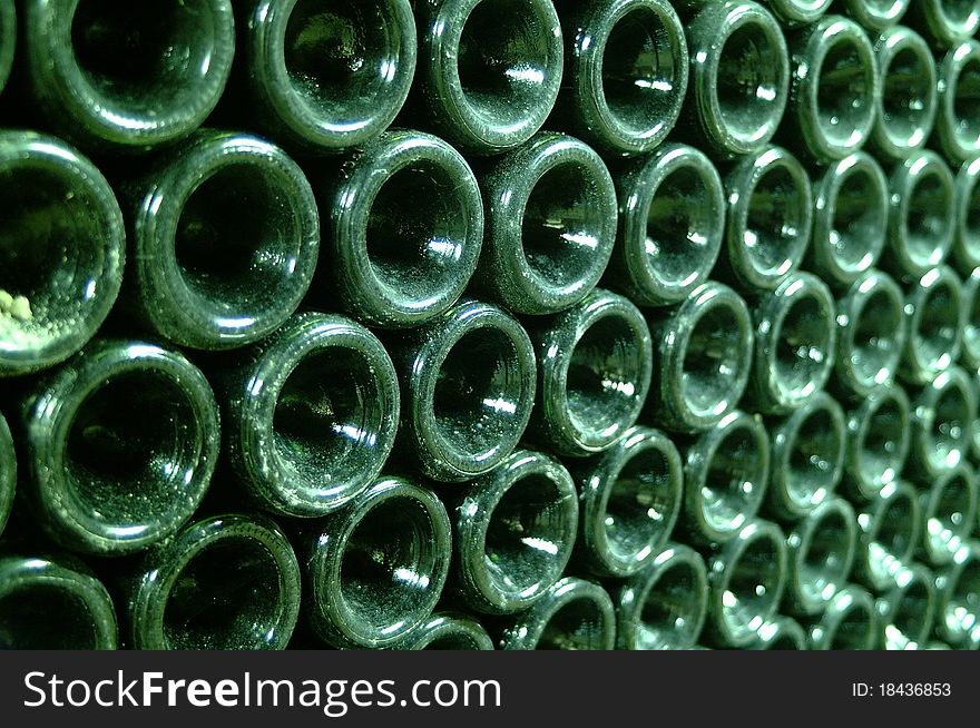 Green wine bottles bottom wall. Green wine bottles bottom wall