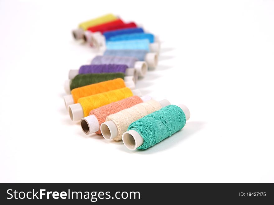 Colored thread on a white background. Colored thread on a white background.