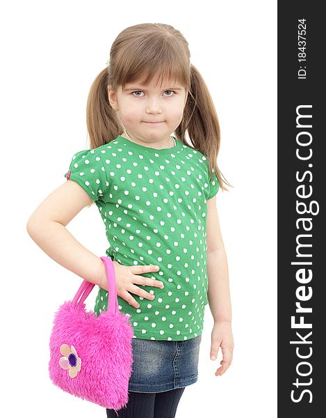Little feshion girl stands with the bag on white