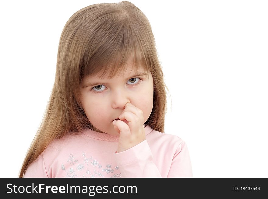 Little girl is picked in a nose on white