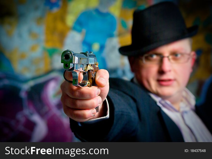 Man aiming with gun