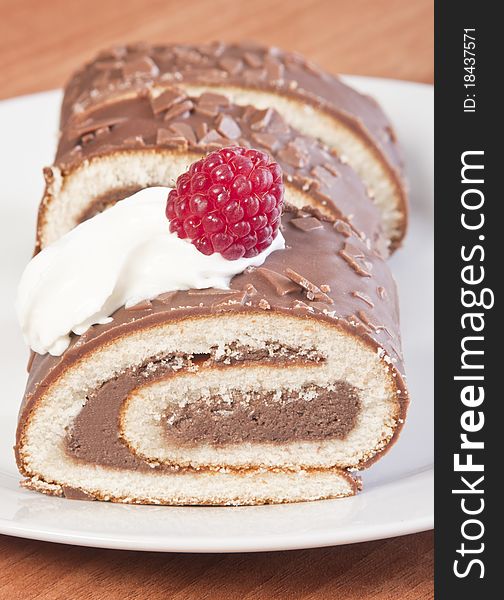 Cake roll 
with cream and raspberry