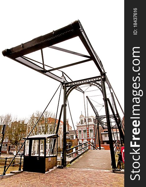 Historic house with old walking bridge in the city of dordrecht in the Netherlands