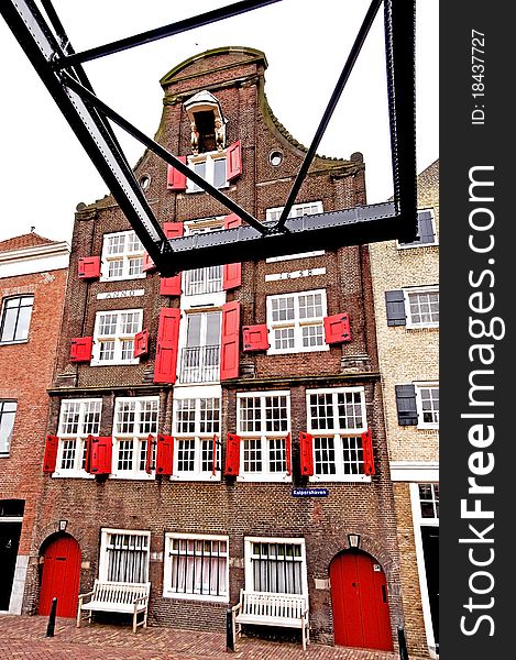 Historic house with old walking bridge in the city of dordrecht in the Netherlands