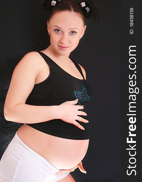Beautiful pregnant woman expecting a baby boy