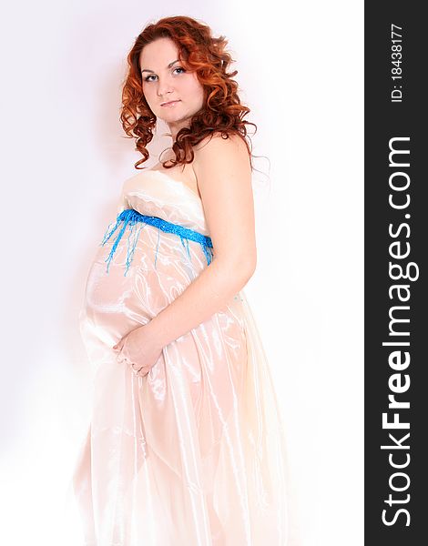 Beautiful pregnant woman expecting a baby girl