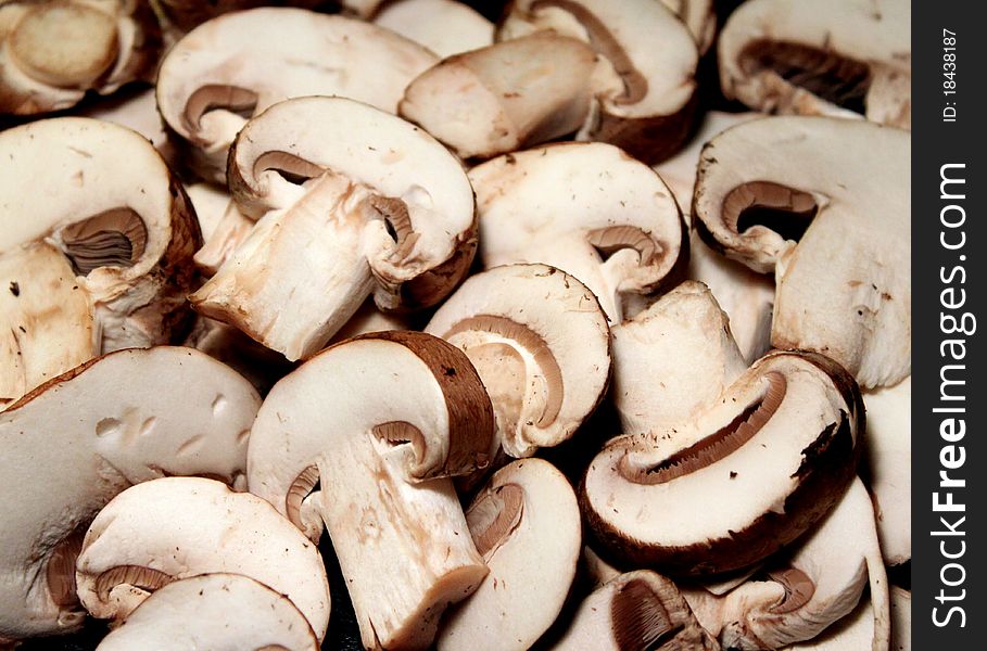 Sliced baby bella / crimini mushrooms. Sliced baby bella / crimini mushrooms