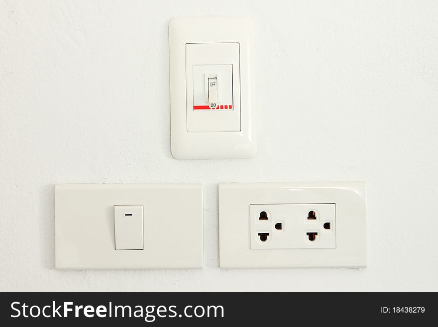Three type electric switch on white wall. Three type electric switch on white wall.