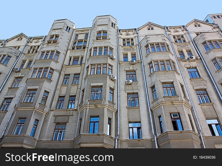 View of multistoried  apartment building and  blue sky, Russia. View of multistoried  apartment building and  blue sky, Russia.