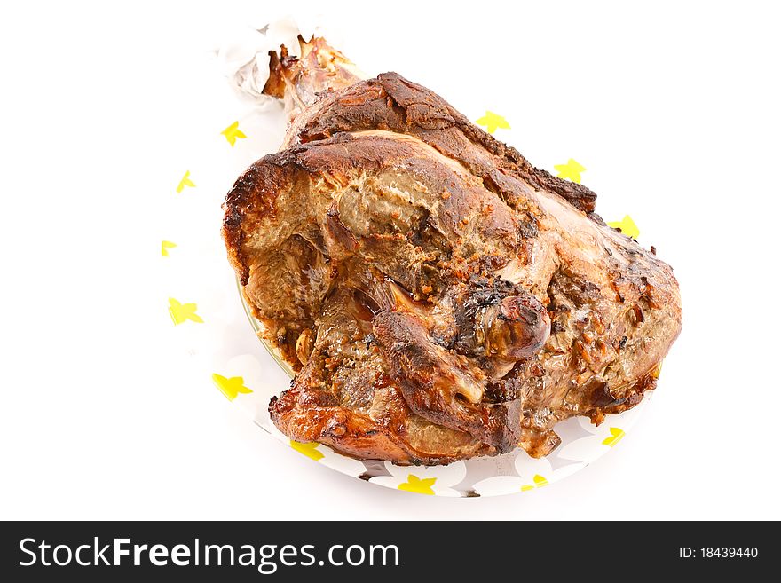 Roast pork leg was photographed on a white background. Roast pork leg was photographed on a white background