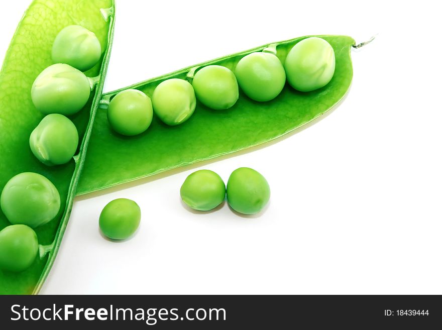 Fresh green pea pod and peas on white background. Fresh green pea pod and peas on white background.