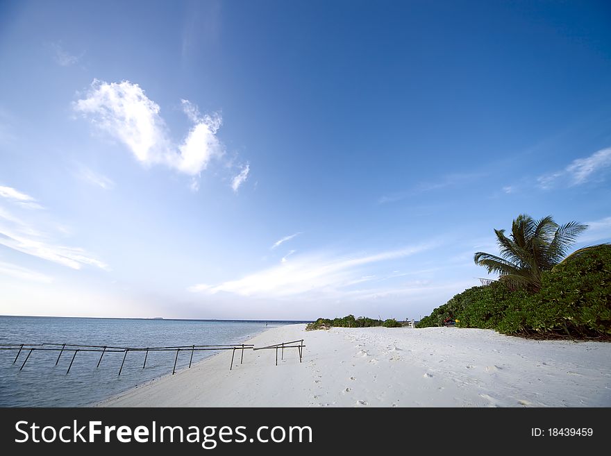 White Sand Beach And Blue Blue Sky