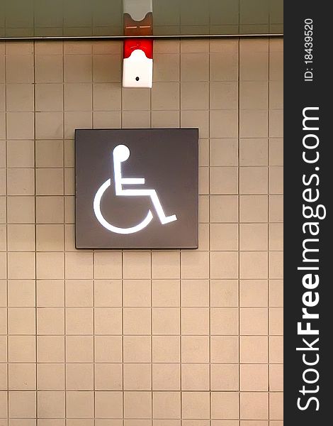 This is the WC door sign, inform people with disabilities, there is set up for their use of the device. This is the WC door sign, inform people with disabilities, there is set up for their use of the device.