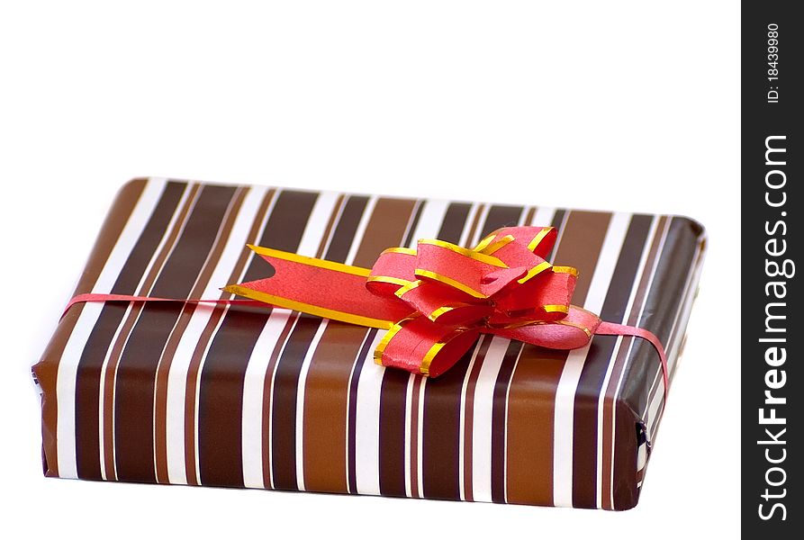 Striped box with ribbon on white background