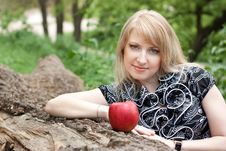 Beautiful Smiling Young Woman With Red Apple In He Stock Photography Beautiful Smiling Young Woman With Red Apple In He Stock Photography
